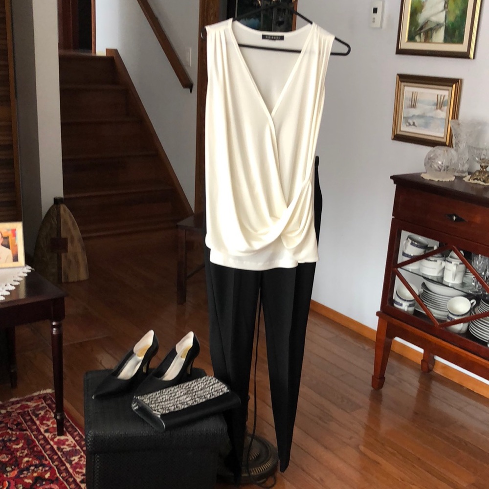 Periphery sleeveless wrap front ivory blouse